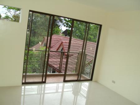 Novem Place Living Area with Balcony