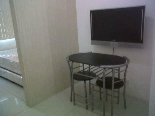 2-seater dining set, wall-mounted flat panel TV