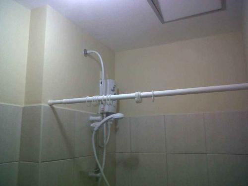 shower w heater, curtain rod, shower curtain