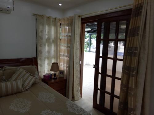 2nd Floor Master's Bedroom w/ Sliding Door to the Terrace