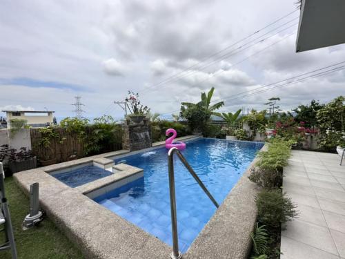  FOR SALE! Overlooking Fully Furnished House and Lot with swimming pool   LOCATION: Vista Grande Subdivision, Talisay City, Cebu  PROPERTY DETAILS   Lot area: 300 sq.m. (2 Lots) Floor area: 260 sq.m.  Price: Php 33,000,000.00 (net of expenses)   Price is 