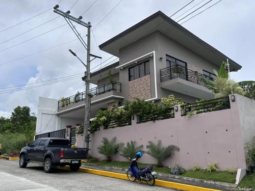  FOR SALE! Overlooking Fully Furnished House and Lot with swimming pool   LOCATION: Vista Grande Subdivision, Talisay City, Cebu  PROPERTY DETAILS   Lot area: 300 sq.m. (2 Lots) Floor area: 260 sq.m.  Price: Php 33,000,000.00 (net of expenses)   Price is 