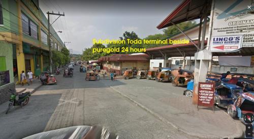 toda terminal and main road beside puregold supermarket