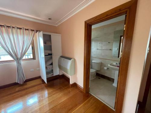 Bedroom with toilet and bath